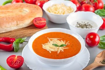 Chorba soup tomato ready-made dish served with vegetables, spice and pita bread