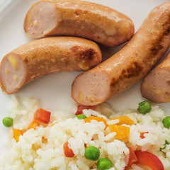 Sausages with boiled rice