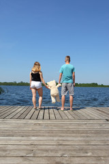 Two teenagers on a lake date.