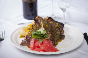 Steak in salad with dressing