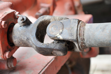 metal steel drive shaft a large size ball bearing support and universal joint with dirty grease