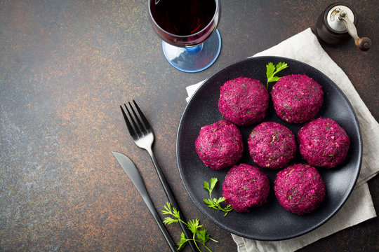 Snack of beet, cabbage, walnut and cilantro. Traditional Georgian dish Pkhali. Selective focus.Top view. Copy space.