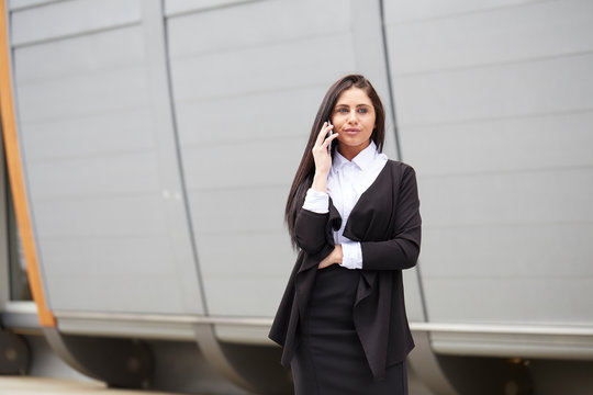 Portrait of a businesswoman using a cell phone