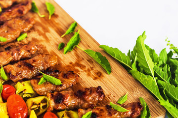 BBQ with ingredient on wood plate