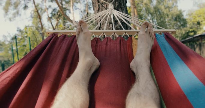 POV, First Person Perspective Lying In A Moving Hammock At A Pinewood