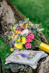 Wedding bouquet on wood