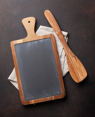 Fototapeta na wymiar Cooking utensils on stone table