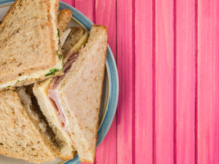 Plate of Assorted Sandwiches in Brown Bread