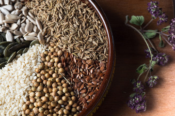 Spices and herbs in ceramic bowl. seasoning. Colorful natural additives.