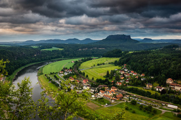 View of the Rathen city and Elbe river from Bastei Bridge in Saxon Switzerland, Germany