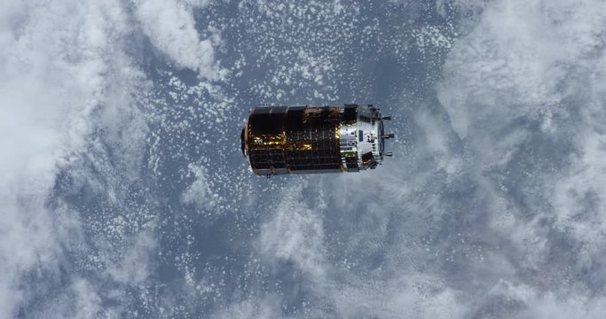 Small pod flies over Earth's atmosphere