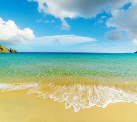 Golden sand in Cala Monte Turno
