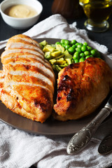 Fried spicy chicken fillet with salad