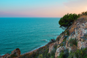 Sunrise on the beach of Calella near Barcelona, Catalonia, Spain