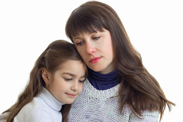 Portrait of a cute little girl with mother close-up