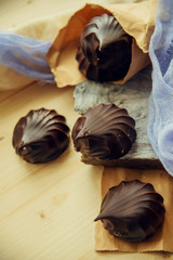 small chocolate-covered cream cake