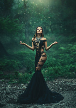 The evil queen is walking in the woods. Wild Princess , vampire, creative color, dark boho