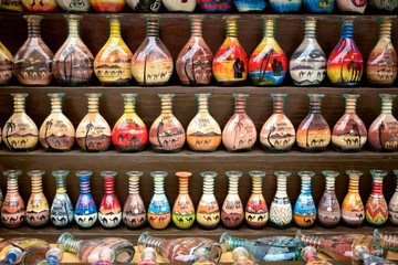 Bottles of colored sand in Jordan