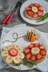 Flowers pancakes with bee for kids breakfast