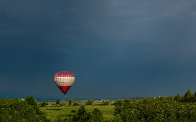 Colorful hot air balloons flying in the blue sky.  Balloon Festival — The Golden Ring Of Russia...