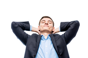 Businessman in dreams about vacation by the sea, portrait on white background