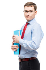 Portrait of a businessman in glasses with a folder for papers on a white background