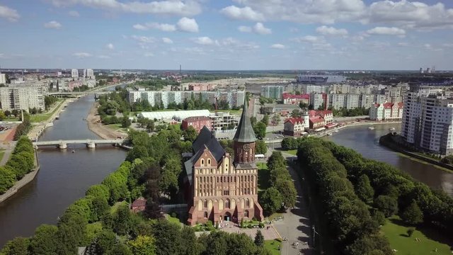 Aerial cityscape of Kant Island in Kaliningrad, Russia at sunny summer day with white clouds in the blue sky