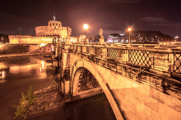 Saint Angel Castle and bridge over the Tiber river in Rome