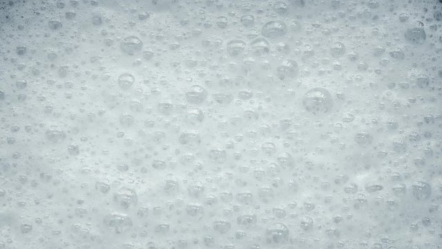 White Foam With Bubbles Popping