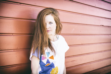 happy styling red hair girl