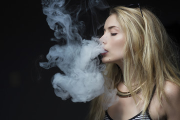 young female vaping electronic cigarette