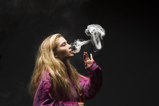 young female vaping electronic cigarette