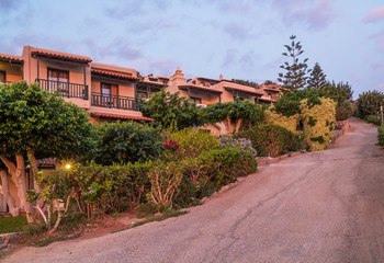 Two-storey bungalow. Near the road. Early morning. Crete. Greece