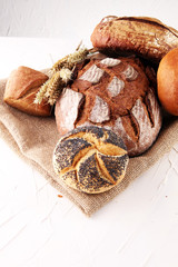 assorted breads isolated on a white background.