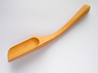 beech wood spoon on white background