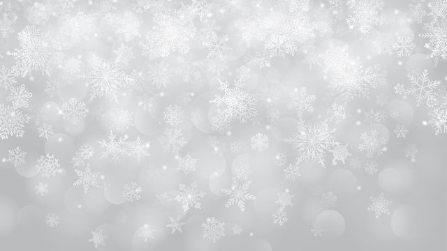 Christmas background of snowflakes with bokeh effect in white