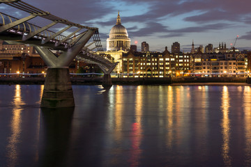 Night photo of Millennium Bridge and  St. Paul Cathedral, London, Great Britain