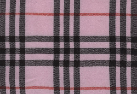 Plaid material, pink with black. Bengaline, cotton texture background