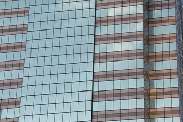 Obraz premium Wall of tall building or glass of skyscraper background.