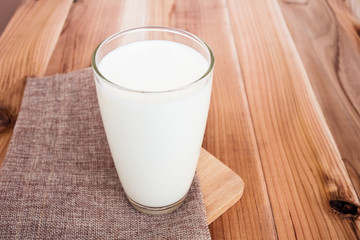 milk glass on wood table