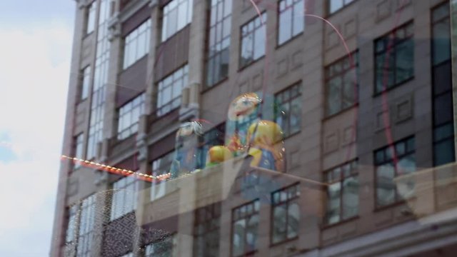 Concept tourism Russia buiding reflected in souvenir shop window