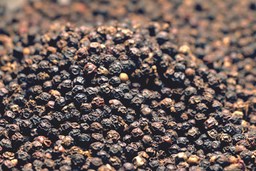 black pepper seeds as background