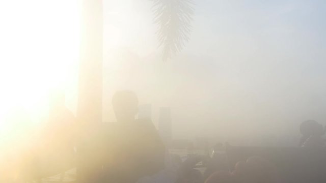 sunset sun light singapore rooftop swimming pool fog view 4k
