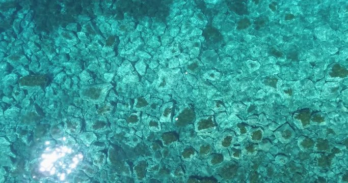 overhead aerial on mediterranean sea clean blue water.Nature environment outdoors travel establisher,Italy,Sicily Salina Eolian Island.Sunny summer.4k drone top view establishing video