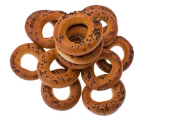A dry bagels isolated on white background. Selective focus on top dry bagel