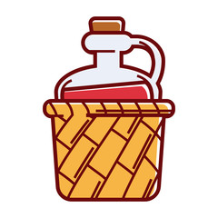 Glass jug of wine with cork in wicker basket