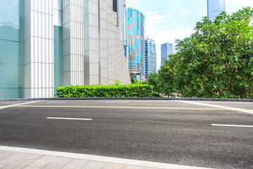 empty asphalt road and modern buildings in shanghai,china.