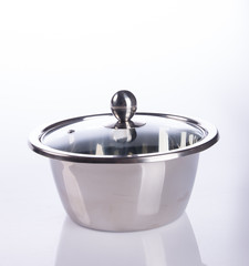 pan or stainless steel pan on background.
