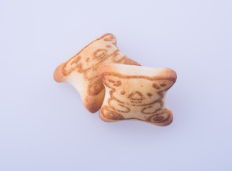 cookies or homemade cookies in shape of bears on background.