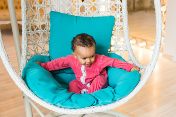 Cute little boy at home. Mixed race child.